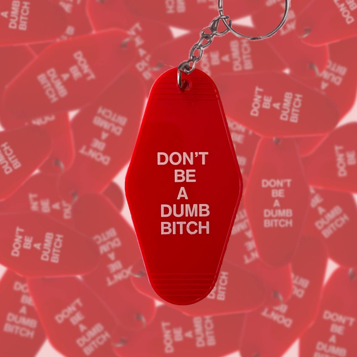 Don't Be A Dumb Bitch Motel Keychain