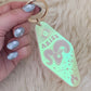 Zodiac Motel Tag Keychain