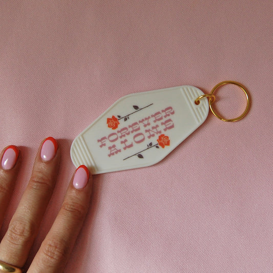 Forever Alone Motel Tag Keychain